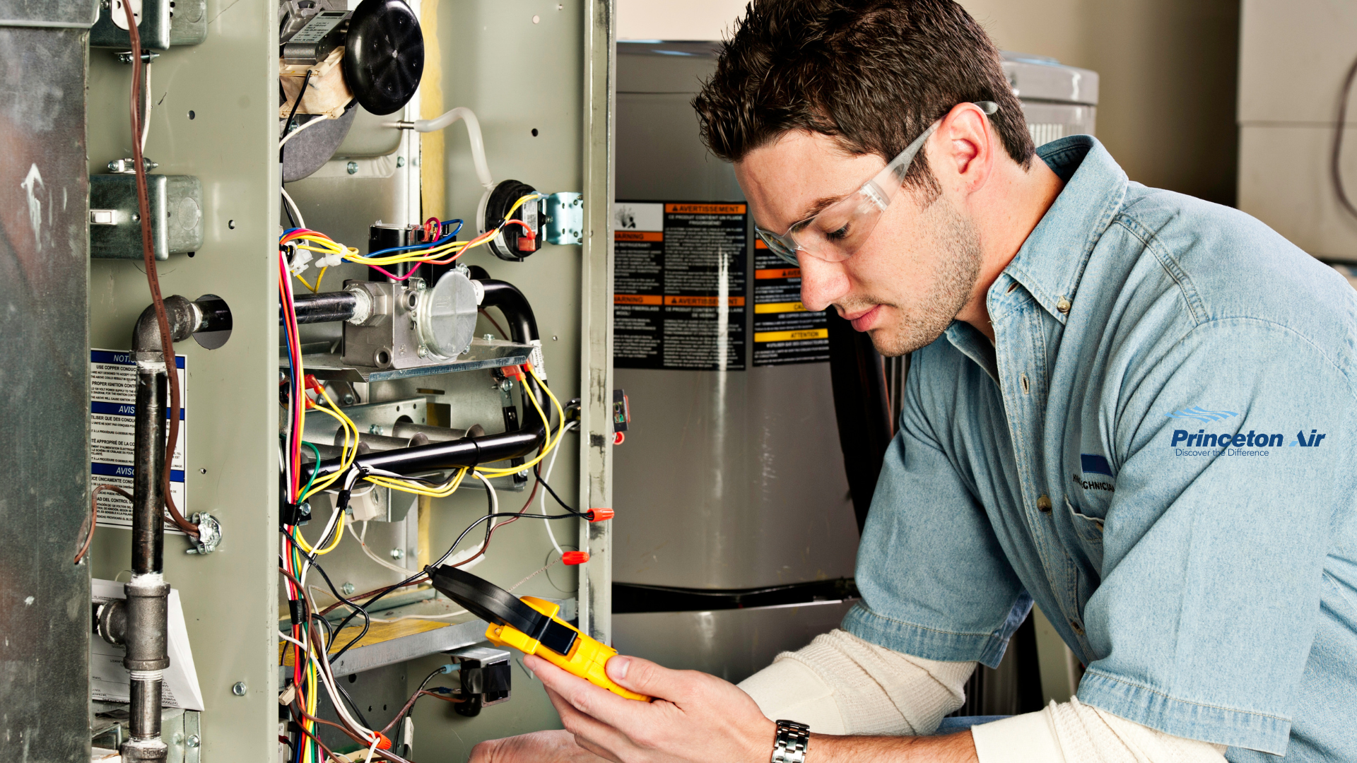 Image of man troubleshooting furnace issues