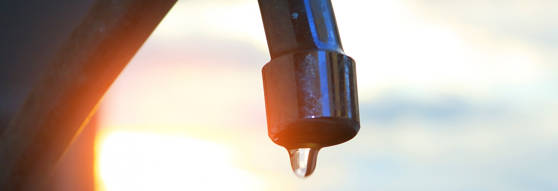 Sink Faucet Dripping Water