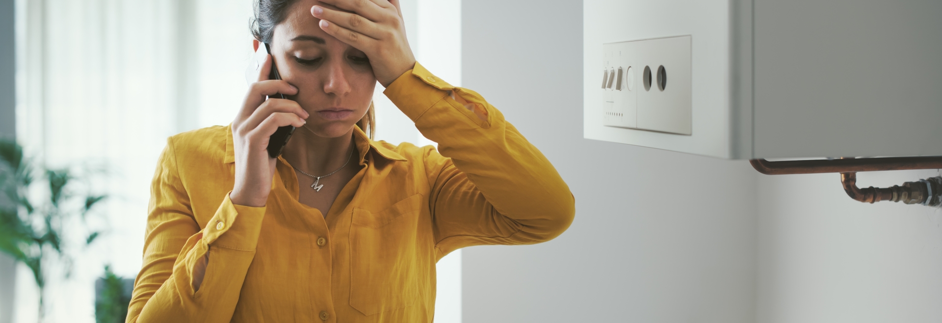 woman making an emergency repair call