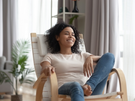 woman at home relaxed in a chair