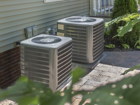 Heat pump outside near house