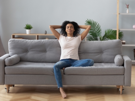 Woman relaxing in comfortable home