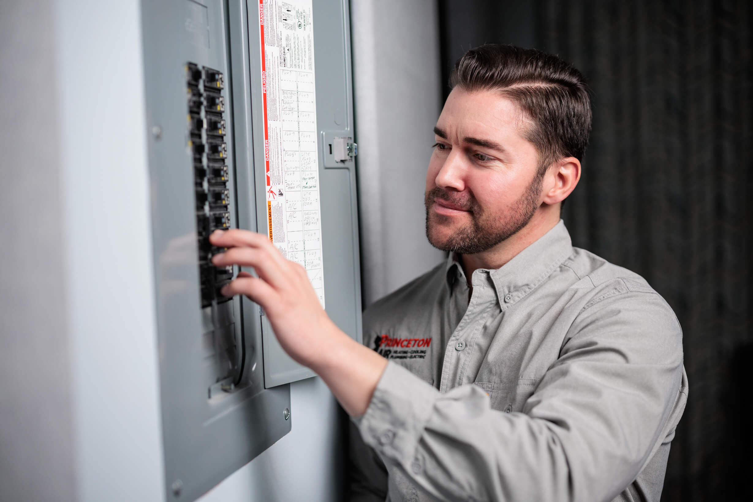 PA electrician examining panel