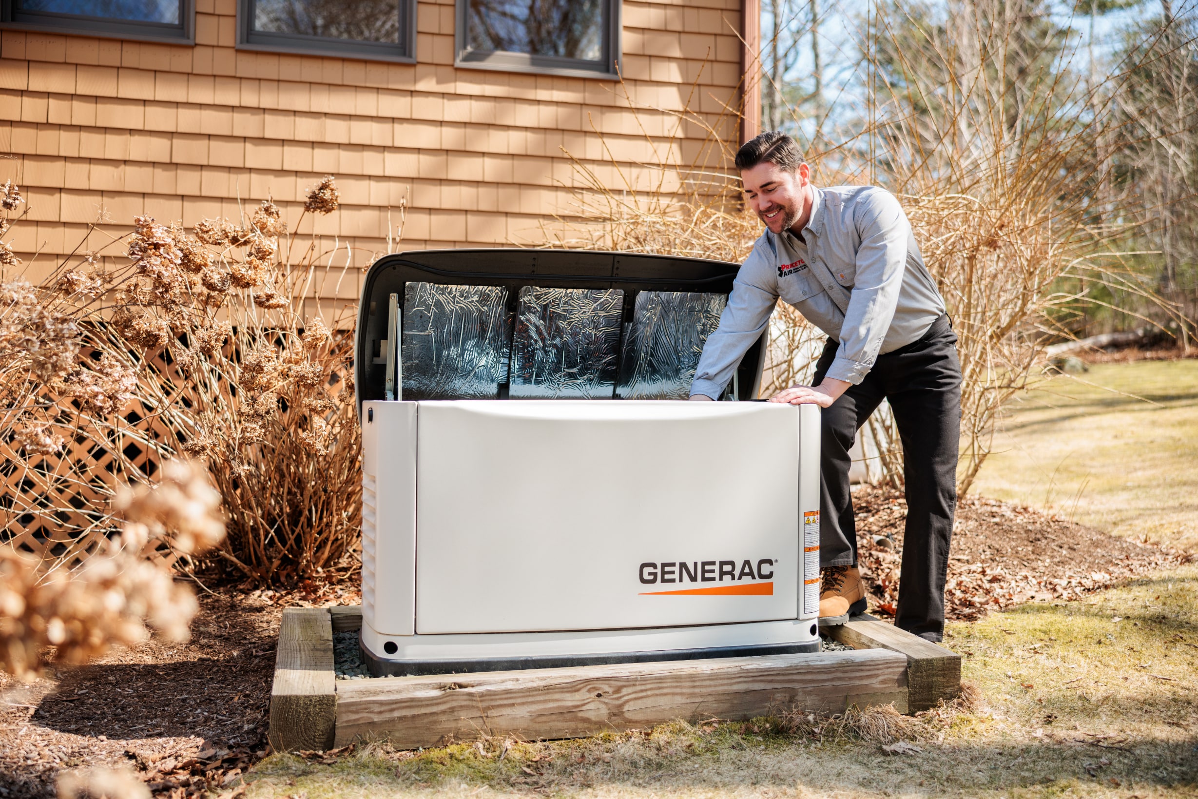 Princeton Air technician installing Generac Generator