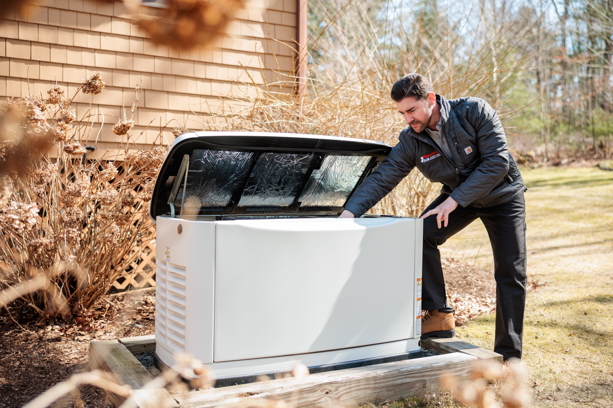 Princeton Air technician installing generator