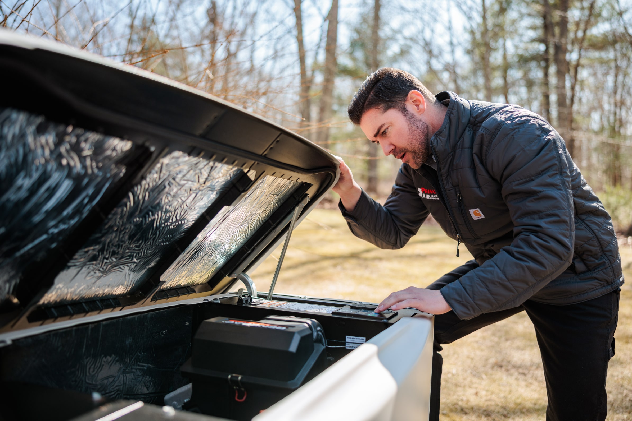 Princeton Air technician servicing generator